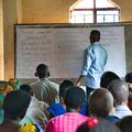 People attend an agriculture training session in Western Uganda