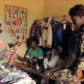 Women in room in Western Kenya with clothes