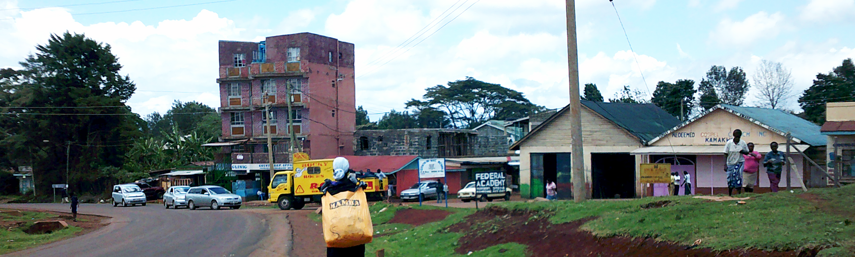 Person carrying chewing gum in a bag to sell in Kenya