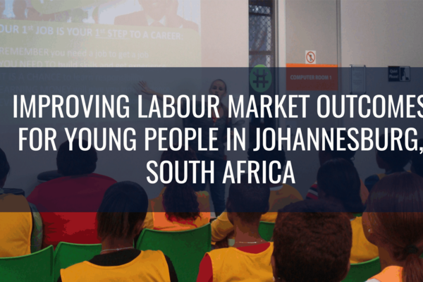 Trainees sit watching the teacher as part of the training programme in Johannesburg