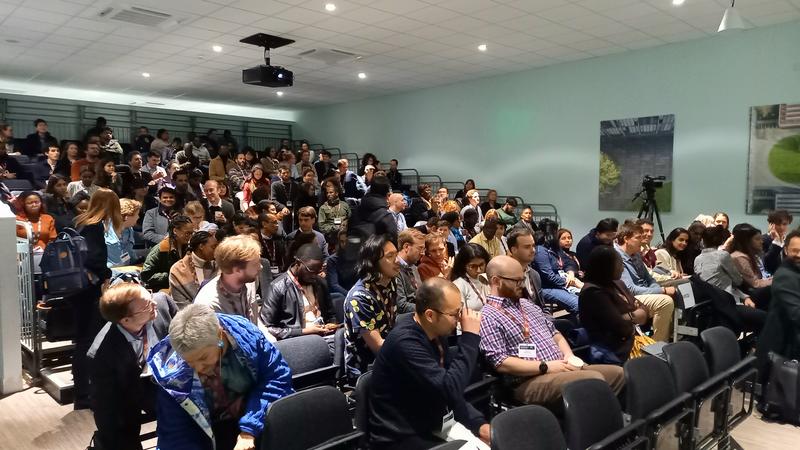 Photograph of a full lecture theatre at the CSAE Conference 2024