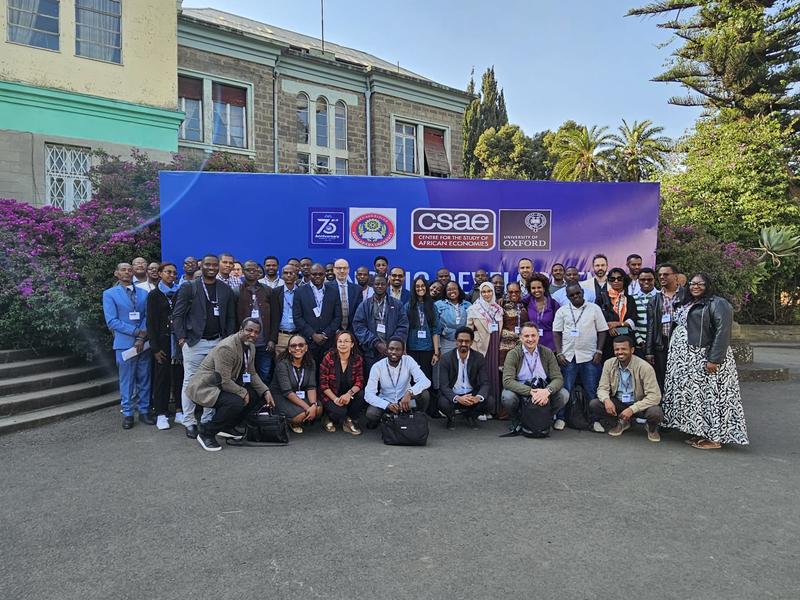 Large group of participants gather in front of the workshop banner at Addis Ababa University, Ethiopia