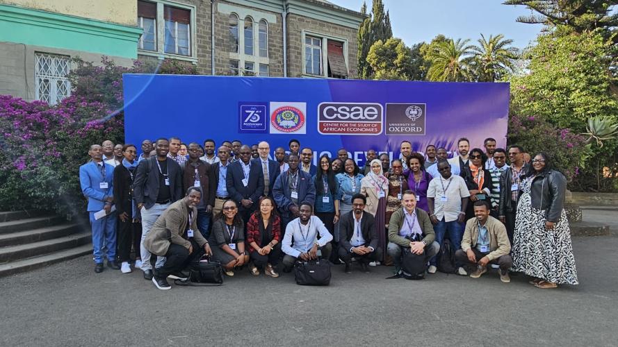 Large group of participants gather in front of the workshop banner at Addis Ababa University, Ethiopia