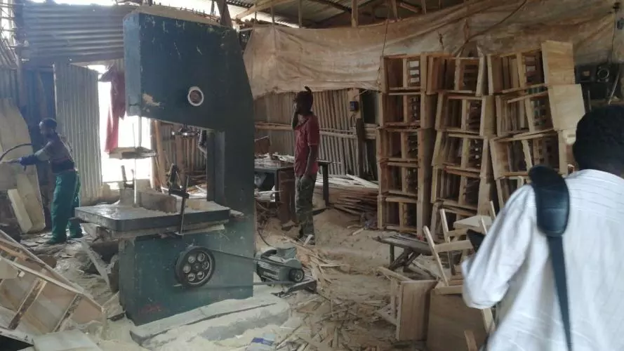 Men working in a messy factory in Addis Ababa