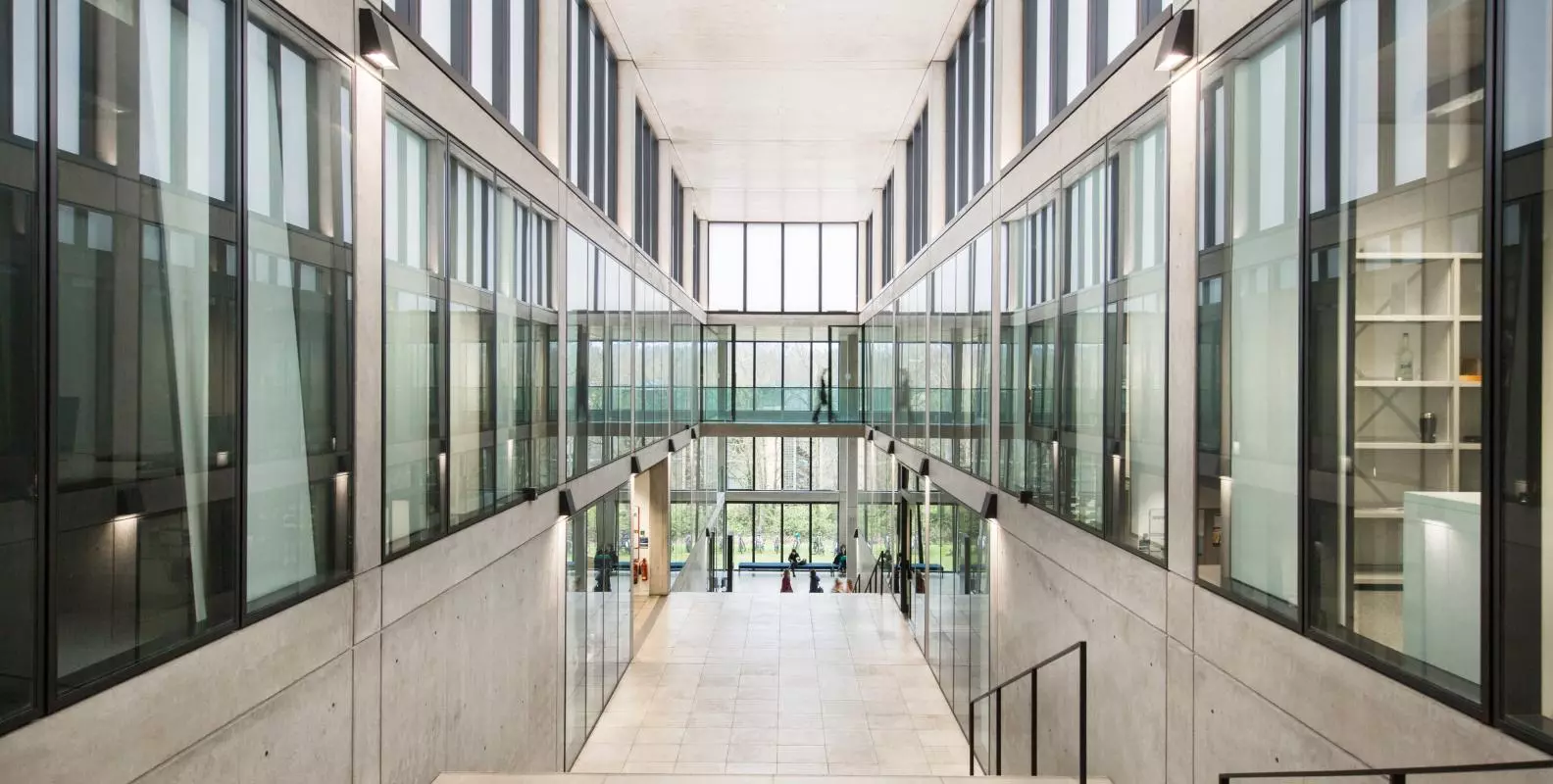 Manor Road Building Foyer with lots of interior windows and a raised walkway
