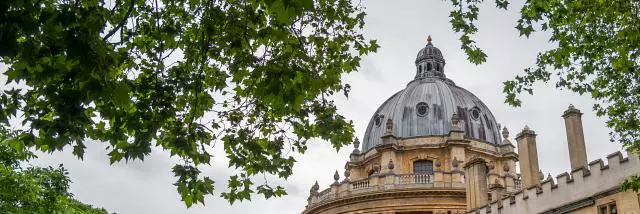 Radcliffe camera through leafy trees