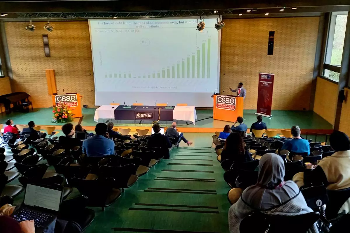 Speaker talking in the Bernard Sunley Lecture Theatre at the CSAE Conference