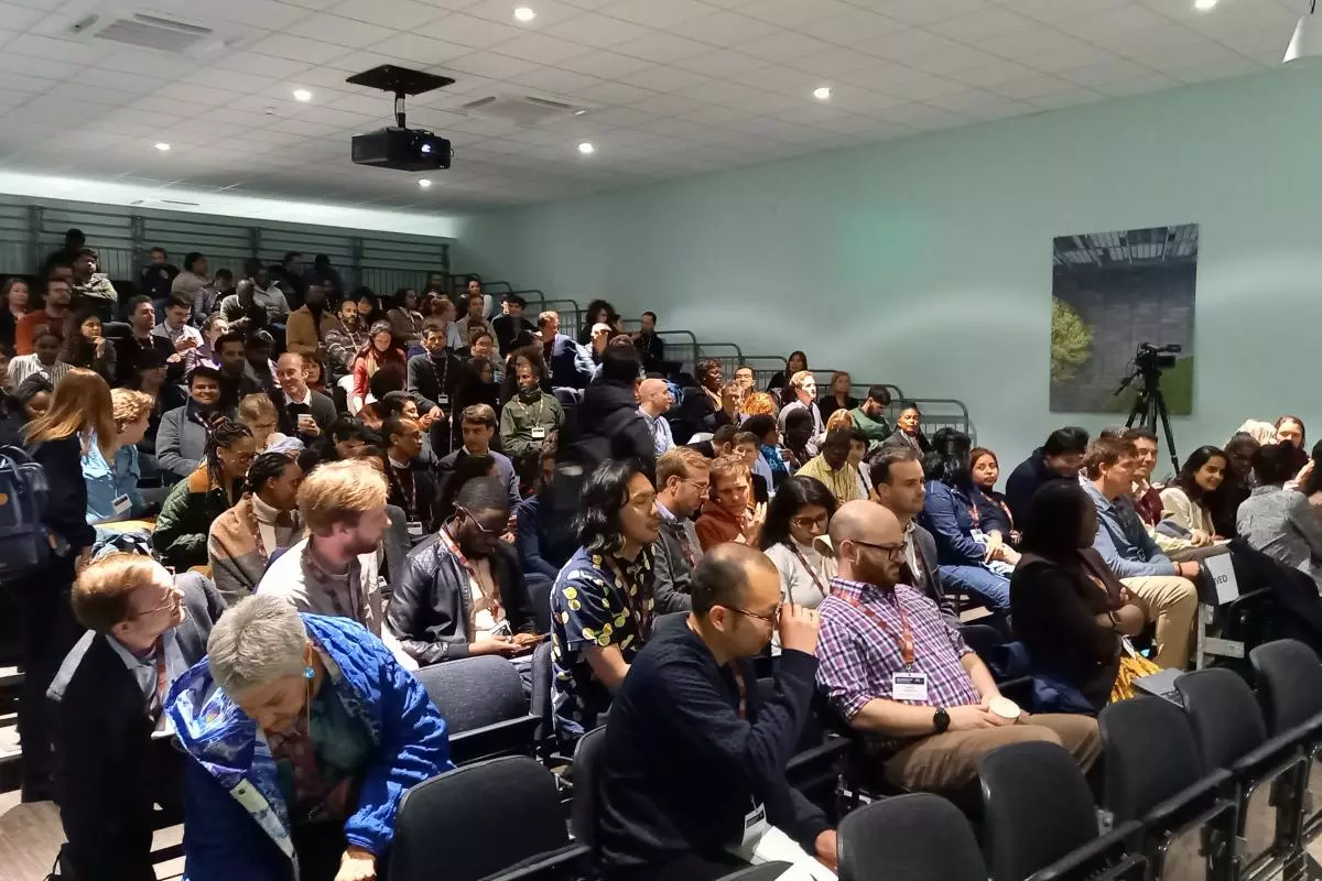 Photo of a full lecture theatre at St Catherine's College at the CSAE Conference 2024.