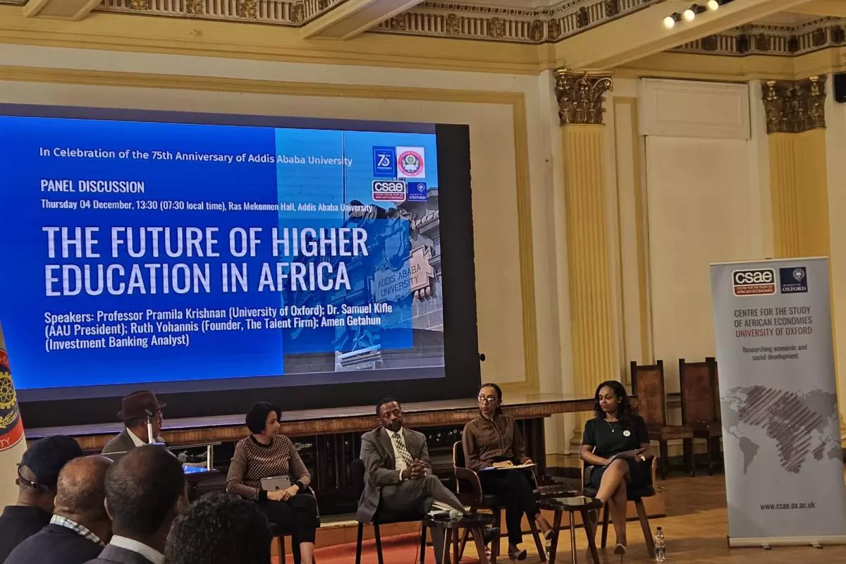 Photo from CSAE Workshop 2025_Future of Higher Education in Africa panel with panellists sitting in front of a screen